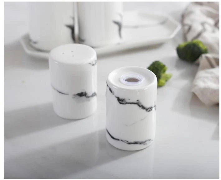 White Ceramic Salt And Pepper Shakers - Main View